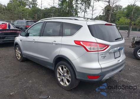 2014 Ford Escape Titanium z USA, uszkodzony, nr VIN 1FMCU9J99EUD98310